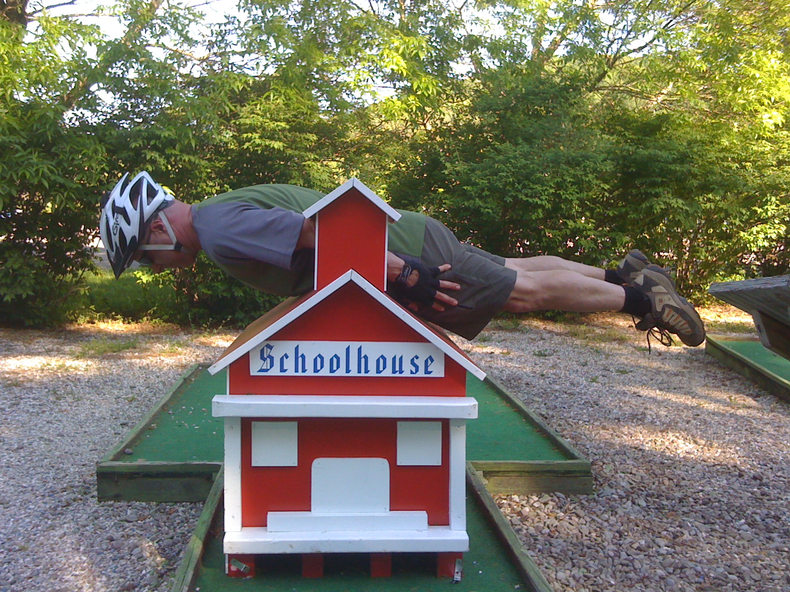 Mr. Brown planking a schoolhouse.